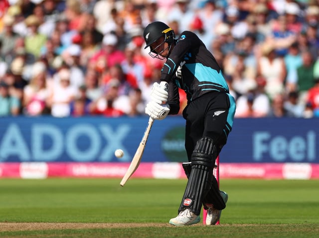 Cricket - IT20 International - England v New Zealand - Edgbaston Cricket Ground, Birmingham, Britain - September 3, 2023 New Zealand's Finn Allen in action as he hits a six off the bowling of England's Chris Jordan Action Images via Reuters/Andrew Boyers/File Photo