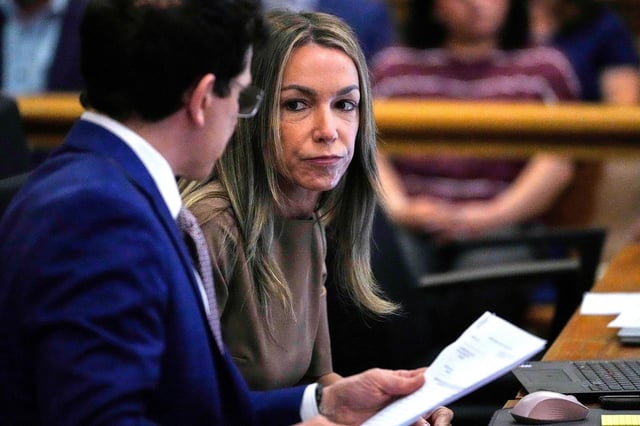 Karen Read talks with her attorney, Robert Alessi, during her trial at Norfolk Superior Court, Thursday, June 12, 2025, in Dedham, Mass. (AP Photo/Charles Krupa, Pool)