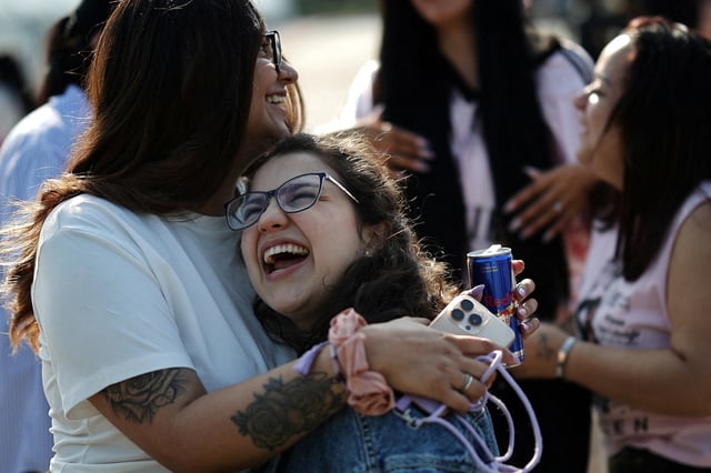BTS fans react after BTS members Jungkook and Jimin, who have been discharged from South Korea’s mandatory military service, left an event in Yeoncheon, South Korea, June 11, 2025. REUTERS/Kim Hong-Ji