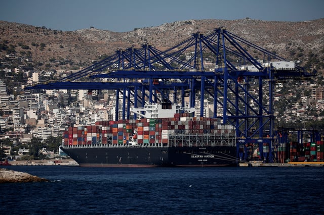 A cargo ship is moored at the Piraeus Container Terminal, near Athens, Greece, September 20, 2017. REUTERS/Alkis Konstantinidis/ File Photo