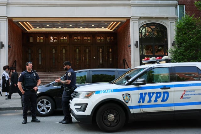 NYPD officers stand guard outside of Congregation Shaarei Zion of Bobov on June 2, 2025 in Borough Park, Brooklyn. (Photo by Michael M. Santiago/Getty Images)