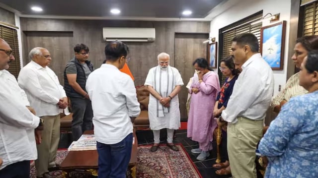 PM Modi Meets Family Of Ex-Gujarat Chief Minister Vijay Rupani After Ahmedabad Plane Crash | Image: X