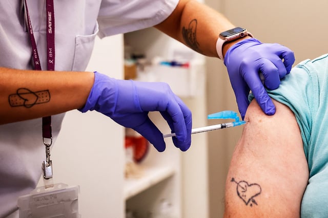 A person receives a Covid-19 vaccine in Valencia, Spain in 2023.