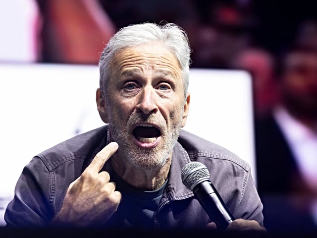 NEW YORK, NEW YORK - SEPTEMBER 07: John Stewart reacts during the Roommates Show Block Party at Rumsey Playfield, Central Park on September 07, 2024 in New York City. (Photo by Michelle Farsi/Getty Images)