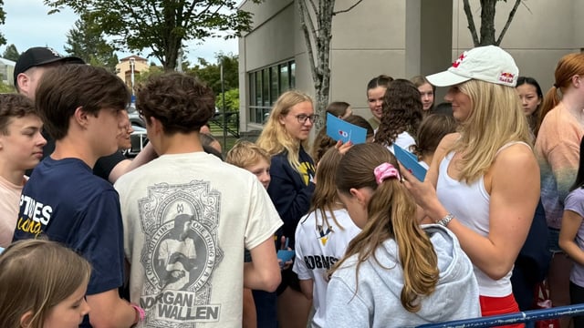 Summer McIntosh meets with fans outside the Commonwealth Place pool in Victoria, B.C. on Thursday.
