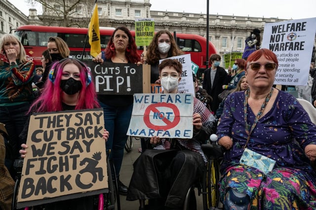 Disabled activists protest outside Downing street in March as Chancellor Rachel Reeves set out her Spring Statement to Parliament containing plans to cut £5bn from disability benefit.  (Photo by Guy Smallman/Getty Images)