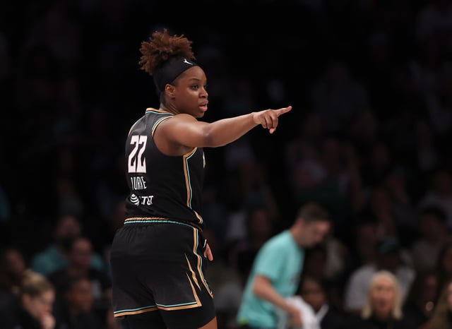 Kennedy Burke #22 of the New York Liberty celebrates her three point shot in the first half against the Golden State Valkyries at Barclays Center on May 29, 2025 in the Brooklyn borough of New York City.