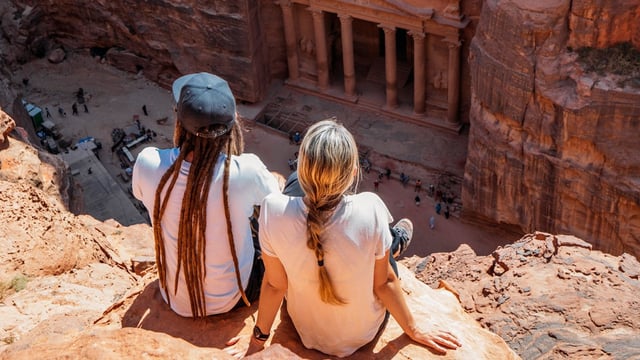 Visitors enjoying the architectural ruins at Petra