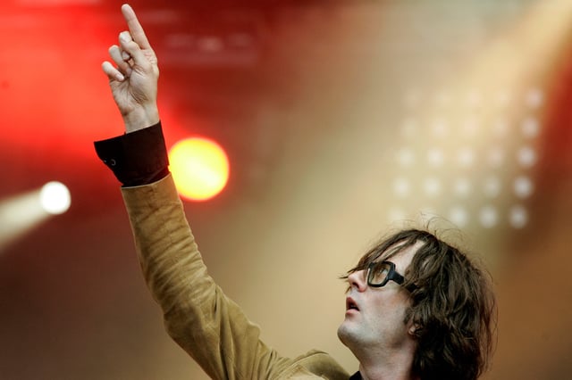 Singer Jarvis Cocker performs on stage during his concert at the Rock-en-Seine Festival in Saint-Cloud, near Paris, August 25, 2007. REUTERS/Benoit Tessier (FRANCE)/File Photo