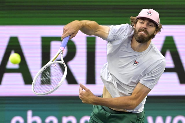 Mar 5, 2025; Indian Wells, CA, USA; Reilly Opelka (USA) hits a serve in his first round match against Roman Safiullin (RUS) during the BNP Paribas Open at the Indian Well Tennis Garden. Mandatory Credit: Jayne Kamin-Oncea-Imagn Images/File Photo