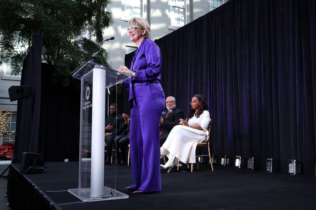 In this 2023 photo, Kim Sajet speaks on stage during the unveiling of Oprah Winfrey's portrait at the Smithsonian National Portrait Gallery in Washington, DC.