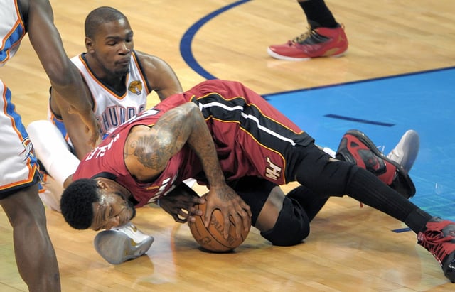 Former Heat forward and current Heat executive Udonis Haslem battles then-Thunder forward Kevin Durant  during the 2012 NBA Finals. (Sun Sentinel file)