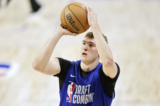 Duke star freshman Cooper Flagg #51 takes part in a shooting drill during the 2025 NBA Draft Combine at Wintrust Arena on May 13, 2025 in Chicago, Illinois.