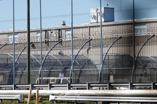 A view of security fencing at Delaney Hall, a 1,000-person detention center operated by private prison company GEO Group for Immigration and Customs Enforcement (ICE), in the Ironbound neighborhood of Newark, New Jersey, U.S., May 10, 2025.  REUTERS/Bing Guan
