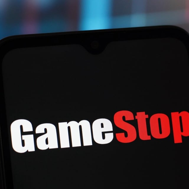 the gamestop logo displayed on a black screen that appears similar to a cellphone