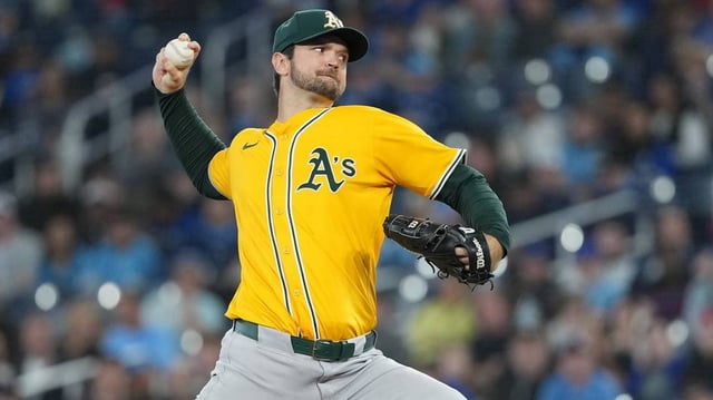 May 31, 2025; Toronto, Ontario, CAN; Athletics starting pitcher Gunnar Hoglund (53) throws a pitch against the Toronto Blue Jays during the first inning at Rogers Centre. Mandatory Credit: Nick Turchiaro-Imagn Images