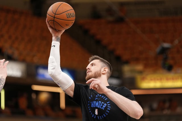 Oklahoma City Thunder center Isaiah Hartenstein warms up prior to Game 4 of the NBA Finals basketball series against the Indiana Pacers, Friday, June 13, 2025, in Indianapolis. (AP Photo/Abbie Parr)