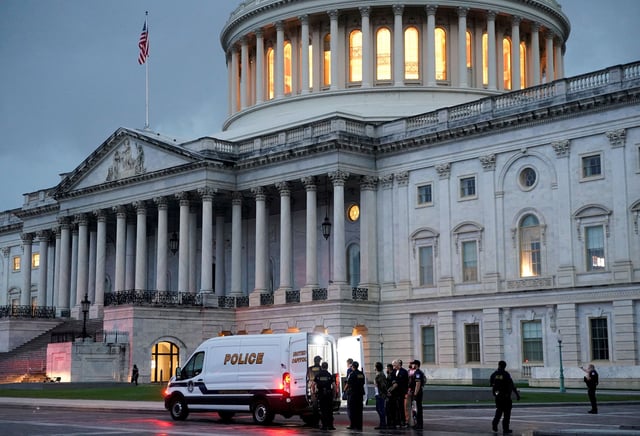 Protesters are detained after breaking through barrier fencing on Capitol Hill in Washington, D.C., U.S., June 13, 2025. REUTERS/Nathan Howard     TPX IMAGES OF THE DAY     