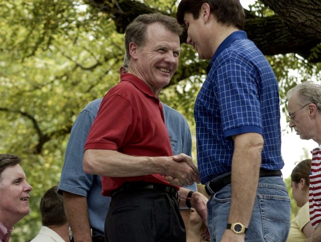 Then-Speaker Michael Madigan, left, greets then-Gov. Rod Blagojevich during the Governor&#39;s Day at the Illinois State Fair on Aug. 18, 2004. (Michael Tercha/Chicago Tribune)