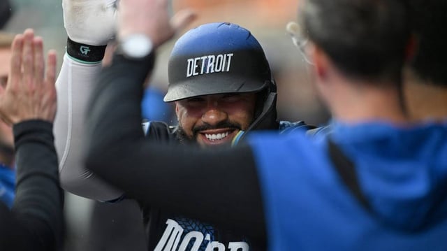 Jun 13, 2025; Detroit, Michigan, USA;  Detroit Tigers second base Gleyber Torres (25) celebrates in the dugout after hitting a lead off home run against the Cincinnati Reds in the first inning at Comerica Park. Mandatory Credit: Lon Horwedel-Imagn Images