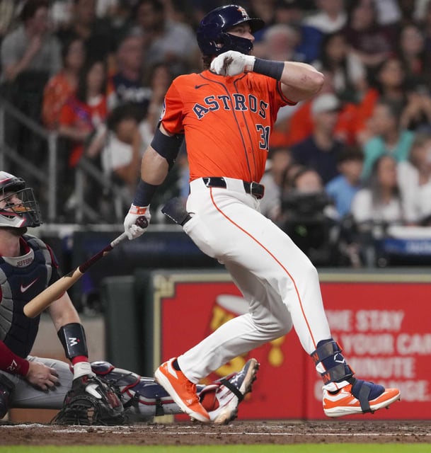 Houston Astros Jacob Melton (31) hits a 2-RBI triple off Minnesota Twins starting pitcher Chris Paddack in the third inning of an MLB baseball game in Houston, Friday, June 13, 2025.