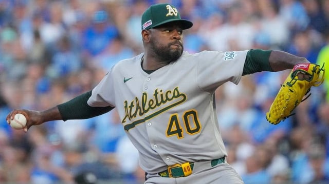 Jun 13, 2025; Kansas City, Missouri, USA; Athletics starting pitcher Luis Severino (40) delivers a pitch against the Kansas City Royals in the first inning at Kauffman Stadium. Mandatory Credit: Denny Medley-Imagn Images