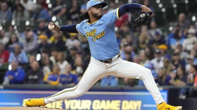 Jun 13, 2025; Milwaukee, Wisconsin, USA; Milwaukee Brewers pitcher Freddy Peralta (51) delivers a pitch against the St. Louis Cardinals in the first inning at American Family Field. Mandatory Credit: Michael McLoone-Imagn Images