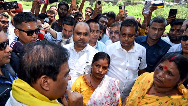 Assam Chief Minister Himanta Biswa Sarma interacts with the locals following the incident where cow meat was thrown at the Hanuman Mandir on Eid, in Dhubri.