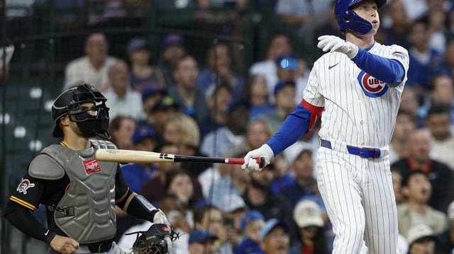 Jun 12, 2025; Chicago, Illinois, USA; Chicago Cubs center fielder Pete Crow-Armstrong (4) hits a two-run home run against the Pittsburgh Pirates during the fourth inning at Wrigley Field. Mandatory Credit: Kamil Krzaczynski-Imagn Images