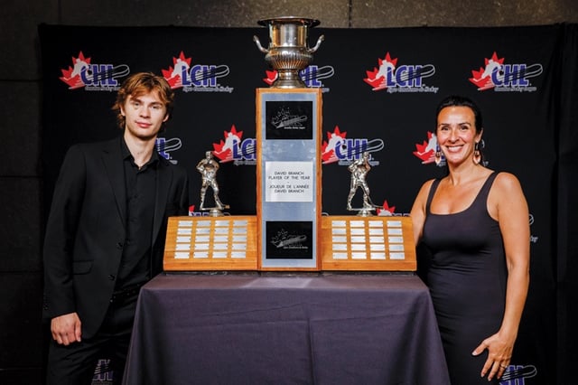 Medicine Hat Tigers forward Gavin McKenna and his mother Krystal pose with the CHL David Branch player of the year award following a ceremony in Toronto on Friday. McKenna is the first Tiger ever to be named the CHL's player of the year.--PHOTO COURTESY JOSH KIM/CHL