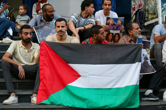 This illustrative image from June 12, 2025 shows activists rally outside Egypt&#39;s Journalists Syndicate to show support in Cairo, Egypt with the Global March to Gaza campaign.