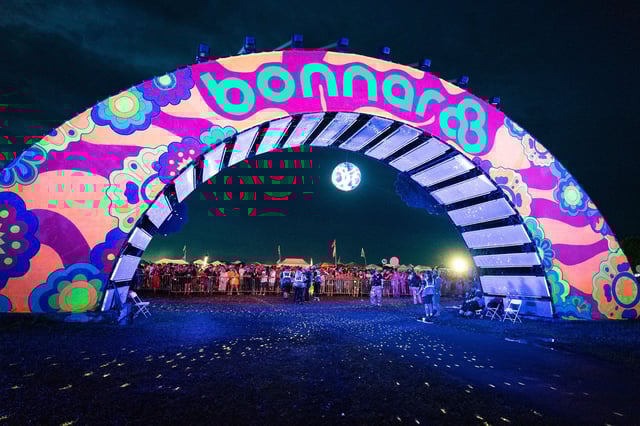 Disappointed fans seen at the Bonnaroo Arch after the Bonnaroo Music and Arts Festival 2025 is canceled due to rain on June 13, 2025 in Manchester, Tennessee.