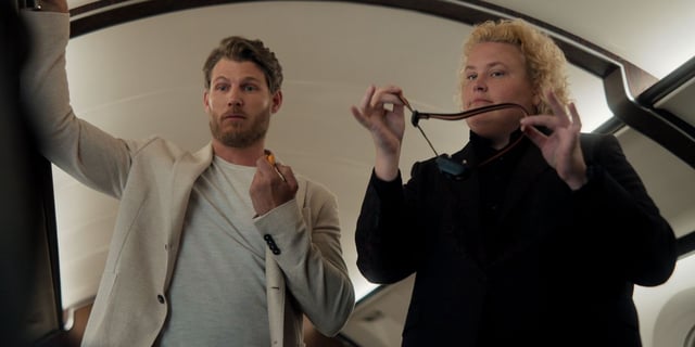 Travis Van Winkle and Forturne Feimster suited up in FUBAR Season 2