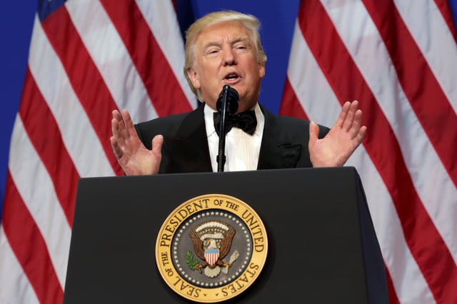 U.S. President Donald Trump speaks at the Armed Services Ball in Washington, U.S., January 20, 2017. REUTERS/Yuri Gripas/File Photo