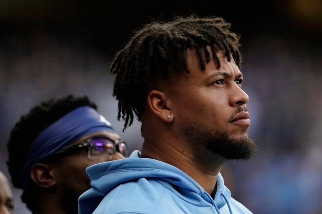 Milwaukee Brewers&#39; Frankie Montas pauses for the National Anthem before a baseball game against the Cincinnati Reds, Friday, Aug. 9, 2024, in Milwaukee. (AP Photo/Aaron Gash)