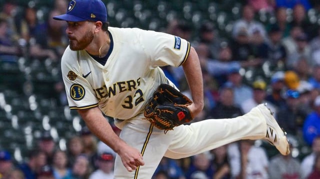 Jun 9, 2025; Milwaukee, Wisconsin, USA; Milwaukee Brewers starting pitcher Aaron Civale (32) throws a pitch in the first inning against the Atlanta Braves at American Family Field. Mandatory Credit: Benny Sieu-Imagn Images