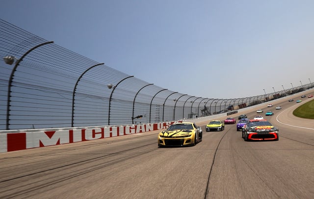 Chase Briscoe, driver of the #19 Bass Pro Shops Toyota, and Kyle Busch, driver of the #8 BetMGM Chevrolet, lead the field on a pace lap prior to the NASCAR Cup Series FireKeepers Casino 400 at Michigan International Speedway on June 08, 2025 in Brooklyn, Michigan.
