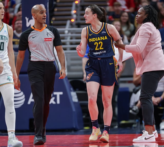 INDIANAPOLIS, INDIANA - JUNE 14: Caitlin Clark #22 of the Indiana Fever reacts after a technical foul during the first half against the New York Liberty at Gainbridge Fieldhouse on June 14, 2025 in Indianapolis, Indiana. NOTE TO USER: User expressly acknowledges and agrees that, by downloading and or using this photograph, User is consenting to the terms and conditions of the Getty Images License Agreement. (Photo by Michael Hickey/Getty Images)