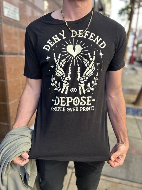One Luigi fan showed up in a T-shirt with the messages found on the bullet casings found at the scene of health care CEO Brian Thompson's killing.