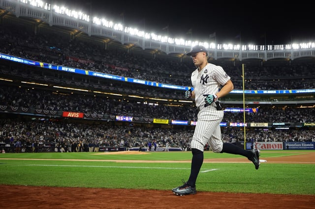 NEW YORK, NEW YORK - OCTOBER 28: Giancarlo Stanton #27 of the New York Yankees runs on the field prior to playing the Los Angeles Dodgers during Game Three of the 2024 World Series at Yankee Stadium on October 28, 2024 in the Bronx borough of New York City. (Photo by Alex Slitz/Getty Images)