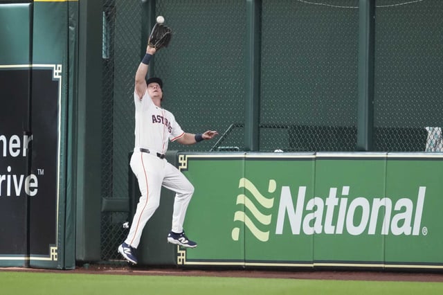 Houston Astros center fielder Jake Meyers (6) catches a fly ball by Minnesota Twins Ty France during the fifth inning of an MLB baseball game in Houston, Saturday, June 14, 2025.