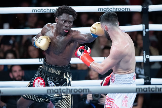 Richardson Hitchins (left) throws a left hand against John Bauza (right) at The Hulu Theater at Madison Square Garden on February 4, 2023 in New York City.