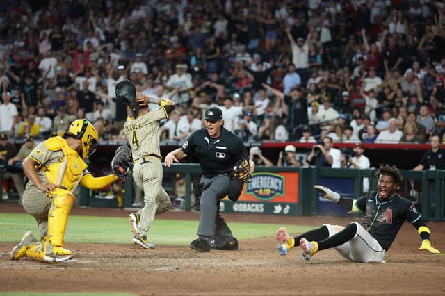 PHOENIX, ARIZONA – JUNE 14: Geraldo Perdomo #2 of the Arizona Diamondbacks reacts after scoring the game-winning run past catcher Elias Díaz #17 of the San Diego Padres during the ninth inning of the MLB game at Chase Field on June 14, 2025 in Phoenix, Arizona. The Diamondbˆacks defeated the Padres 8-6. (Photo by Christian Petersen/Getty Images)