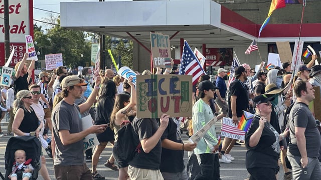 Demonstrators carry signs and chant while marching during a “No Kings” protest, Saturday, June 14, 2025, in Salt Lake City. (AP Photo/Amanda Barrett)