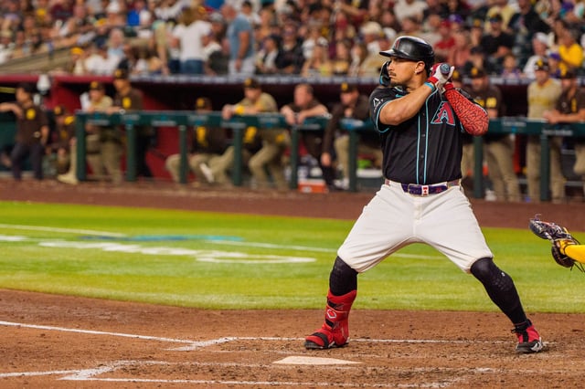 Jun 14, 2025; Phoenix, Arizona, USA; Arizona Diamondbacks infielder Josh Naylor (22) at bat in the seventh inning against the San Diego Padres at Chase Field. Mandatory Credit: Allan Henry-Imagn Images