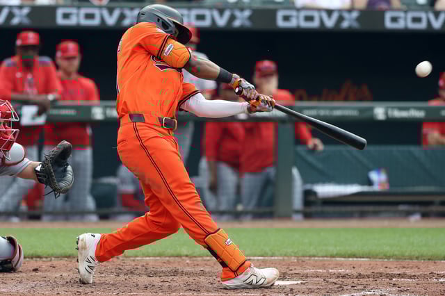 Jun 14, 2025; Baltimore, Maryland, USA; Baltimore Orioles outfielder Cedric Mullins (31) hits a home run during the sixth inning against the Los Angeles Angels at Oriole Park at Camden Yards. Mandatory Credit: Daniel Kucin Jr.-Imagn Images