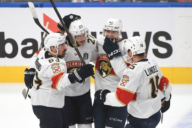 Eetu Luostarinen of the Florida Panthers celebrates a goal against the Edmonton Oilers with teammates Brad Marchand, Gustav Forsling and Anton Lundell of the Florida Panthers during the third period in Game Five of the 2025 Stanley Cup Final at Rogers Place on June 14, 2025 in Edmonton, Alberta, Canada.