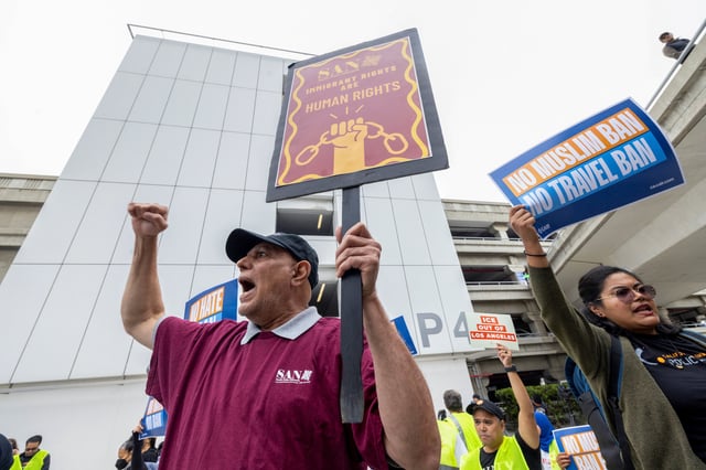 People take part in a protest sponsored by the Council on American Islamic Relations (CAIR) against U.S. President Donald Trump's new sweeping travel ban, which went into effect as his administration intensifies its immigration crackdown, at Los Angeles International Airport (LAX) in  Los Angeles, California, U.S., June 9, 2025.   REUTERS/Jill Connelly