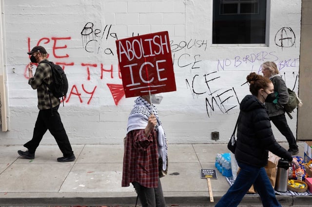 Demonstrators protest Sunday outs 478 Tehama St., which houses the Intensive Supervision Appearance Program run by ICE. 