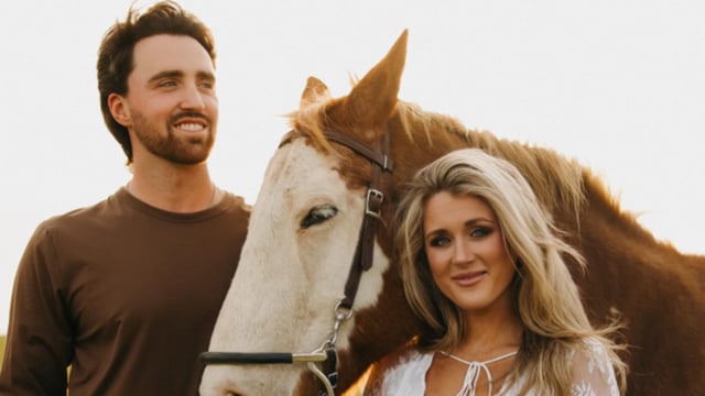 Riley Gaines reveals baby bump while addressing feud with Simone Biles.